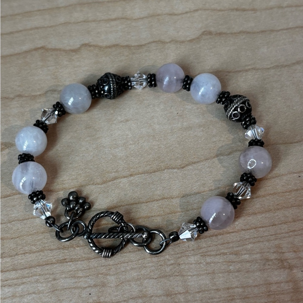 Light rose beaded bracelet/ delicate color/ silver tone/ measures 8 in length